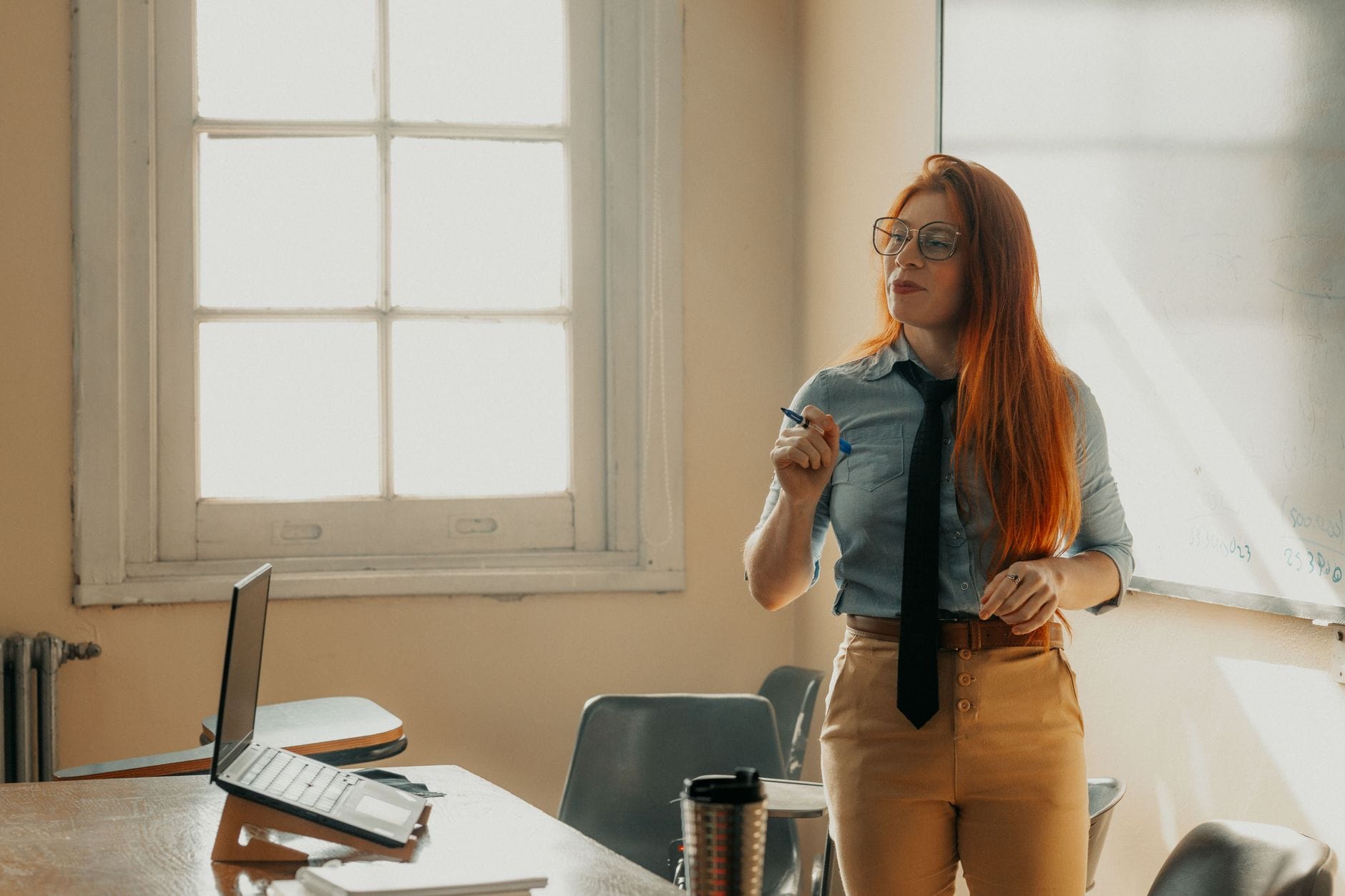 Professional woman in a bright office considering a career change