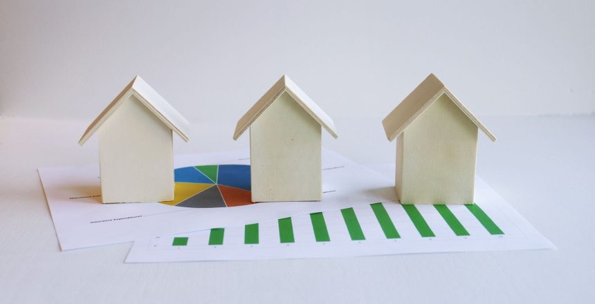 Saskatchewan real estate market report with charts and house models